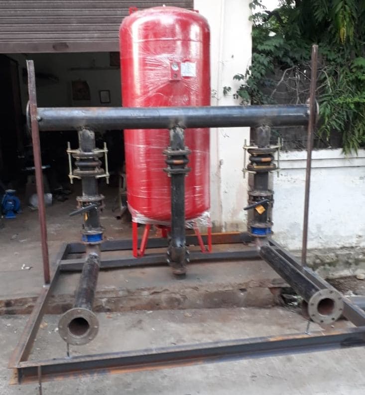 In-house fabricated hydro-pneumatic pumping system